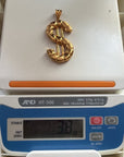 Lustrous Gold Dollar Sign Pendant
